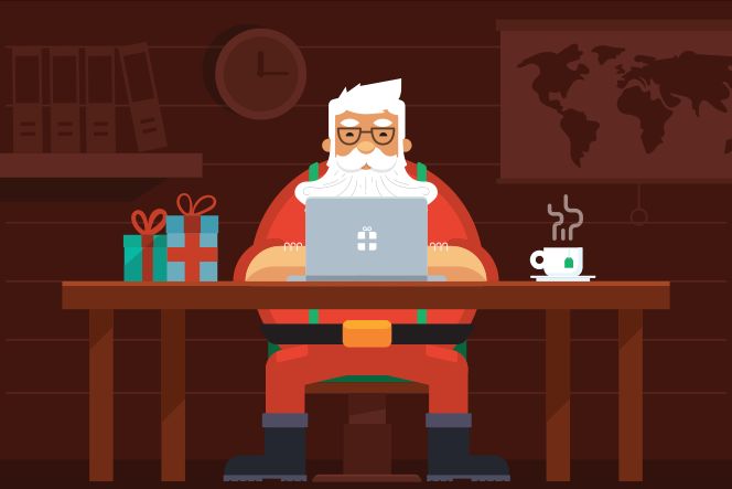 Der Weihnachtsmann arbeitet am Laptop